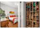 View of the bedroom with hardwood floors and a view of the walk in wine storage at 637 Linwood Ne Ave, Atlanta, GA 30306