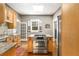 Kitchen showcasing a center island with a stainless steel range and granite countertops at 637 Linwood Ne Ave, Atlanta, GA 30306