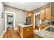 Spacious kitchen with center island, stainless steel appliances, and hardwood floors at 637 Linwood Ne Ave, Atlanta, GA 30306