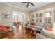 Open living room with hardwood floors, large windows, and comfortable seating at 637 Linwood Ne Ave, Atlanta, GA 30306