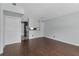 Open-concept living area with hardwood floors and ample natural light at 6691 Colchester Pl, Norcross, GA 30093