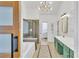 Contemporary bathroom featuring a shower, soaking tub, double sink vanity, and modern decor at 1055 Crabapple Parc Dr, Roswell, GA 30076
