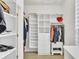 Bright closet features built in shelving and drawers for optimal storage solutions at 1055 Crabapple Parc Dr, Roswell, GA 30076