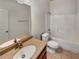 Clean bathroom featuring a vanity with a sink and a shower-tub combination at 120 Madison Grace Ave, Mcdonough, GA 30252