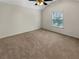 Comfortable bedroom with natural light and neutral carpet flooring at 120 Madison Grace Ave, Mcdonough, GA 30252