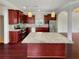 Spacious kitchen with stainless steel appliances, granite countertops, and a large island at 120 Madison Grace Ave, Mcdonough, GA 30252