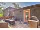 Enjoy relaxing on the back deck with grill, lounge seating and an outdoor table at 2344 Belmont Dr, Decatur, GA 30032
