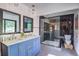 Modern bathroom features a double vanity, large walk-in shower with patterned tile at 2344 Belmont Dr, Decatur, GA 30032