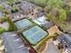 Overhead view of the community's tennis courts, pool, and surrounding neighborhood at 4908 Waters Edge Trl, Roswell, GA 30075