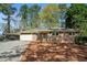 Charming brick ranch home with a carport and well-maintained front yard at 3712 Spring Hill Se Rd, Smyrna, GA 30080