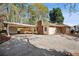 Lovely single-story brick home featuring an attached carport and spacious driveway at 3712 Spring Hill Se Rd, Smyrna, GA 30080