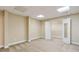 Basement bedroom with neutral carpet and closet at 4385 Old Hamilton Mill Rd, Buford, GA 30518