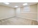 Basement with beige walls, white trim and one window at 4385 Old Hamilton Mill Rd, Buford, GA 30518