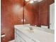 Bathroom with white vanity, sink, faucet and large mirror at 4385 Old Hamilton Mill Rd, Buford, GA 30518