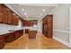 A beautiful kitchen with lots of cabinet space and hardwood flooring at 4385 Old Hamilton Mill Rd, Buford, GA 30518