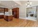 Spacious kitchen features a large island, lots of cabinet space, bright windows and hardwood floors at 4385 Old Hamilton Mill Rd, Buford, GA 30518