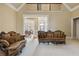 Comfortable sofas in a living room with bright views and an open design concept at 4385 Old Hamilton Mill Rd, Buford, GA 30518