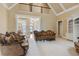 Bright living room boasting high ceilings and views into other living spaces at 4385 Old Hamilton Mill Rd, Buford, GA 30518