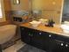 Luxurious bathroom with a modern vanity, free-standing tub, and stylish mosaic tile backsplash at 11 Reese Way # 11, Avondale Estates, GA 30002