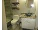 Stylish bathroom featuring a vessel sink, decorative vanity, and tiled shower at 11 Reese Way # 11, Avondale Estates, GA 30002
