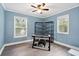 Bedroom with hardwood floors and a ceiling fan at 1601 Sycamore Nw Dr, Kennesaw, GA 30152