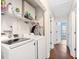 Laundry room with washer, dryer and storage space at 1601 Sycamore Nw Dr, Kennesaw, GA 30152