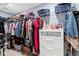 Walk-in closet with hanging rods, shelves, and plenty of storage space at 1601 Sycamore Nw Dr, Kennesaw, GA 30152
