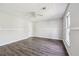 Bright bedroom featuring neutral walls, and updated flooring at 2973 Heavenly Ln, Snellville, GA 30078