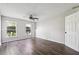 Bright bedroom featuring new floors, and two windows at 2973 Heavenly Ln, Snellville, GA 30078
