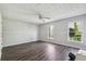 Bright bedroom featuring neutral walls, and updated flooring at 2973 Heavenly Ln, Snellville, GA 30078