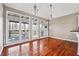 Bright dining area with large windows overlooking the deck, perfect for entertaining or casual dining at 2973 Heavenly Ln, Snellville, GA 30078