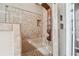 Modern shower with stone tiling and multi-jet shower system at 2973 Heavenly Ln, Snellville, GA 30078