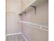 Walk-in closet with carpeted floor, light pink walls, and adjustable wire shelving at 2973 Heavenly Ln, Snellville, GA 30078