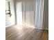 Bright living room with modern hard wood flooring and patio doors at 3156 Nectarine Cir, Decatur, GA 30034