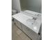 Spacious bathroom vanity with white cabinets, chrome hardware, and a large mirror above at 3156 Nectarine Cir, Decatur, GA 30034