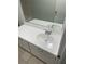 Bathroom vanity with white cabinets, chrome hardware, and a large mirror above at 3156 Nectarine Cir, Decatur, GA 30034