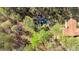 An aerial view showing the location in a vast, wooded area close to roads, highlighting its accessibility at 4670 Sundridge Trl, Fairburn, GA 30213