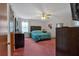 Bedroom with classic decor, carpet floor, and ceiling fan at 4670 Sundridge Trl, Fairburn, GA 30213