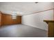 Unfinished basement space with a window, ready for customization at 2223 Jay Se Ln, Smyrna, GA 30080
