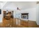 Open floorplan with a fireplace and hardwood floors looking towards the kitchen at 2223 Jay Se Ln, Smyrna, GA 30080