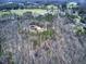 An aerial view capturing a secluded home site amidst lush forests and scenic natural surroundings at 302 Vinson Mountain Loop, Rockmart, GA 30153
