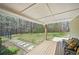Covered back porch overlooking a spacious yard and wooded area at 302 Vinson Mountain Loop, Rockmart, GA 30153