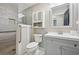 Updated bathroom featuring a modern vanity, tiled shower, and neutral color scheme at 302 Vinson Mountain Loop, Rockmart, GA 30153