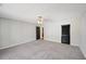 Spacious bedroom with neutral carpet, ceiling fan, with multiple door access points at 302 Vinson Mountain Loop, Rockmart, GA 30153