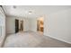 Spacious bedroom with carpet and access to a sink area and closet at 302 Vinson Mountain Loop, Rockmart, GA 30153