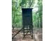 Camouflaged hunting stand on stilts blends into the forest, providing an elevated vantage point at 302 Vinson Mountain Loop, Rockmart, GA 30153