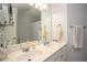 Bathroom featuring a double sink vanity and a large mirror at 5980 Eagle Tiff Ln, Sugar Hill, GA 30518