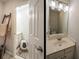 Bathroom with updated light fixture, sink, mirror, and ladder for towel storage at 5980 Eagle Tiff Ln, Sugar Hill, GA 30518