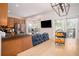 Dining room featuring a wood table next to the kitchen with stainless steel appliances at 5980 Eagle Tiff Ln, Sugar Hill, GA 30518