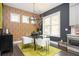 Bright dining area features modern wallpaper, stylish light fixtures, and a chic glass table with white chairs at 1821 Huntington Hills Nw Ln, Atlanta, GA 30309